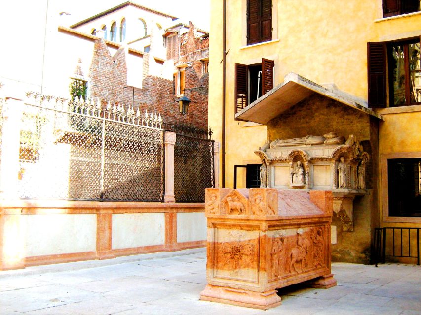 Verona: History and Hidden Gems Guided Walking Tour - Porta Borsari and the Roman pulse beneath the streets