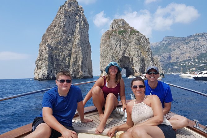 Very Small Group Capri Boat Excursion with Transfer from Positano - On-board comfort: music, photos, snacks, and drink value