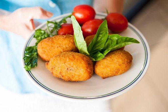 Walking Food Tour in Sorrento w/ Limoncello Factory Lemon Grove - First bites in central Sorrento: sfogliatella, panini, and fried rice balls